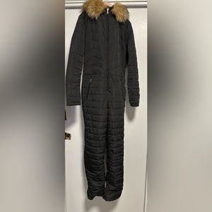 Women’s snow onesie with hoodie in black. Size Medium